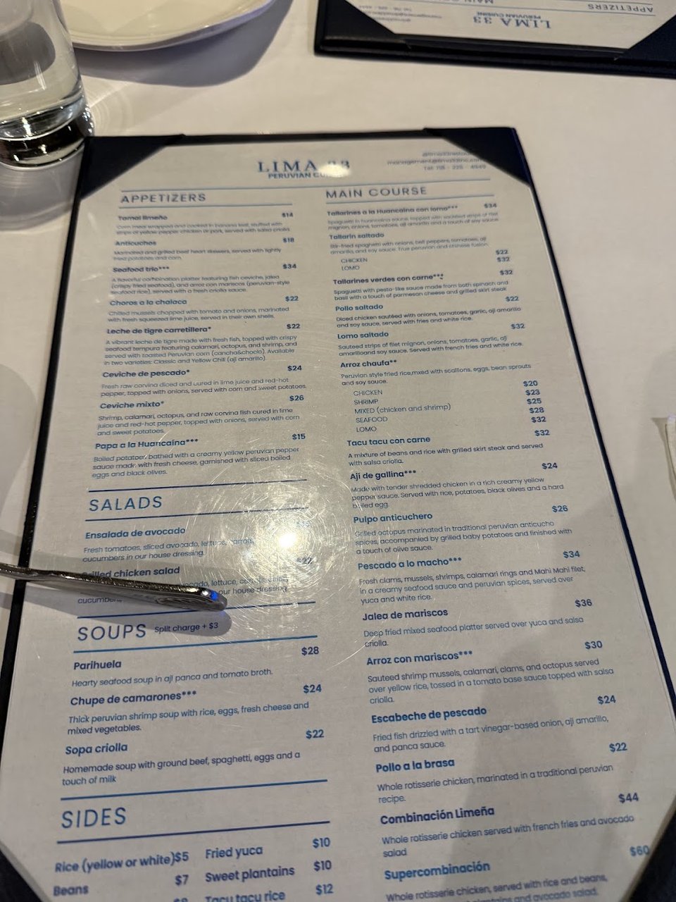 Printed menu with Peruvian dishes and drinks.